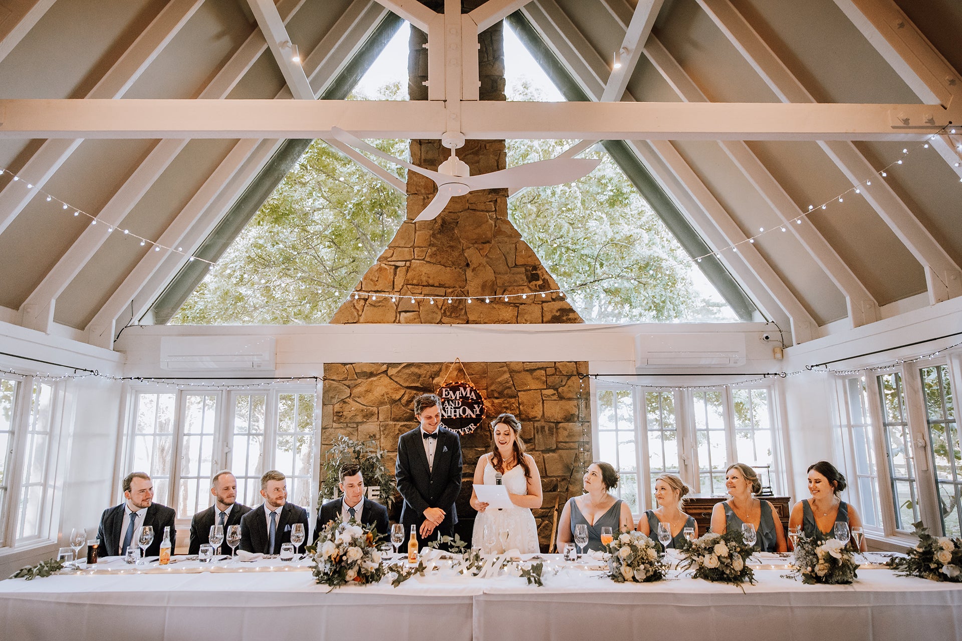 Bride giving speech at The Residence, Scotchmans Hill, elegant Bellarine Peninsula wedding venue with cathedral ceilings and fireplace.