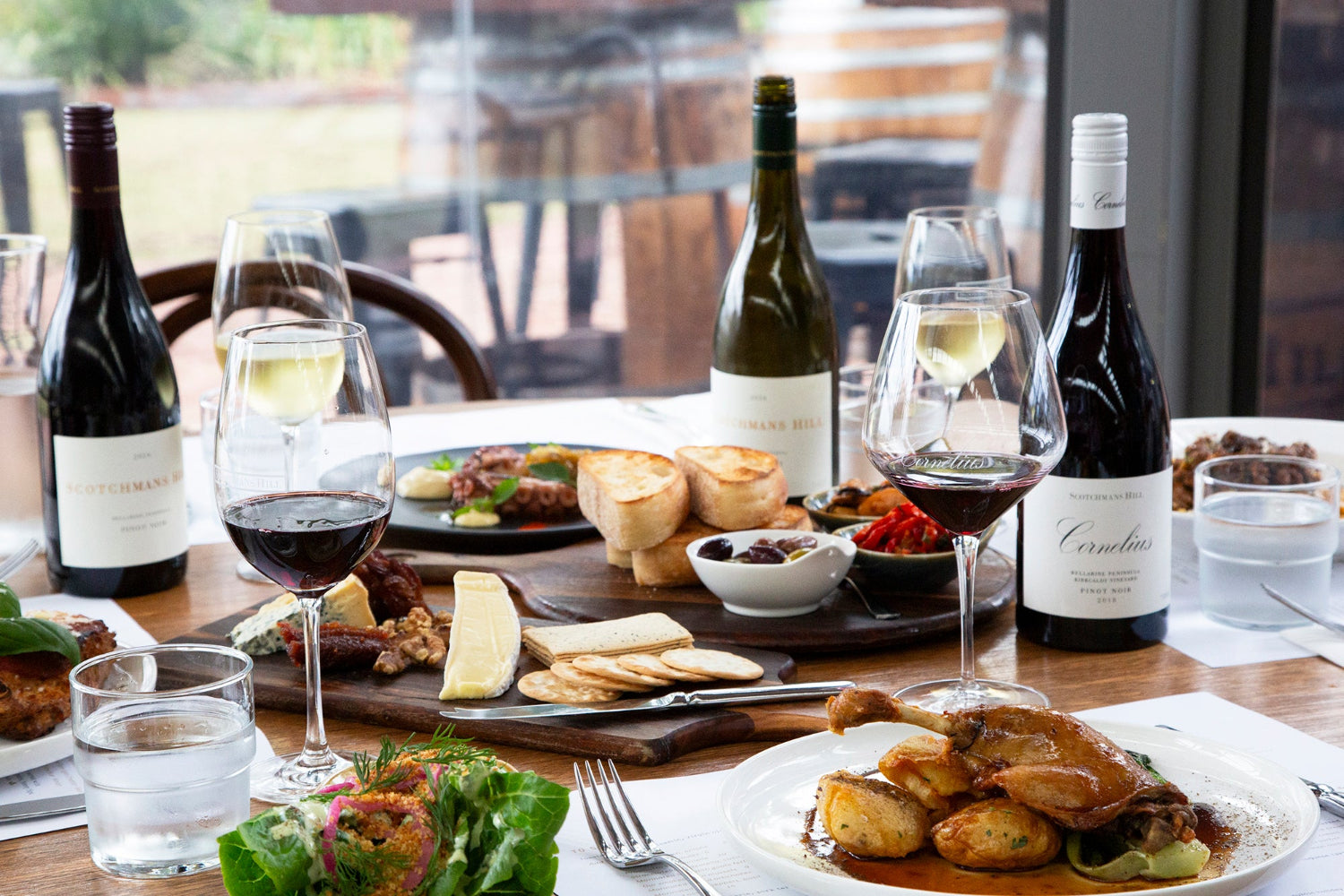 Dining at Scotchmans Hill restaurant with shared dishes and Bellarine Peninsula wines
